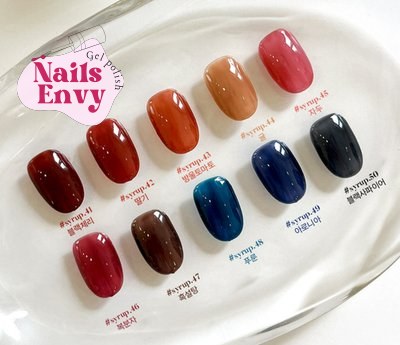 A set of YOGURT NAIL Tanghulu Syrup Gel Nail Polish 10 Colors, showcasing a glossy Korean manicure look.