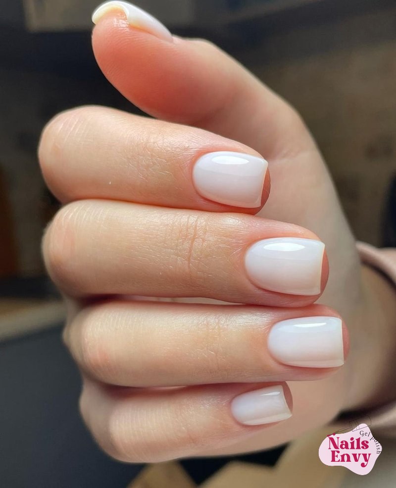 Milky white gel polish provides a clean, classic look for any occasion.