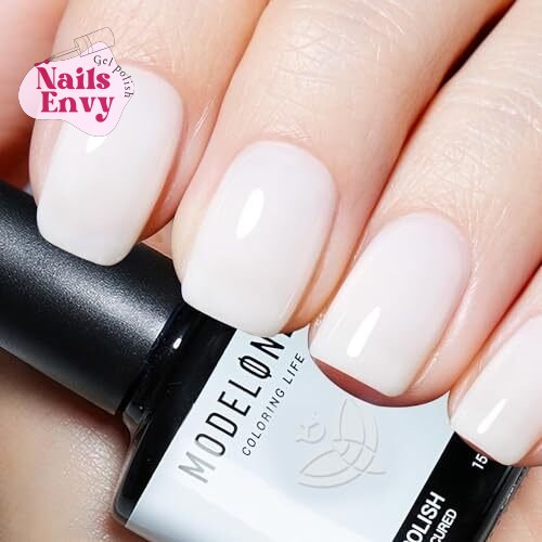 This milky white gel nail polish offers a sheer and elegant nude finish.